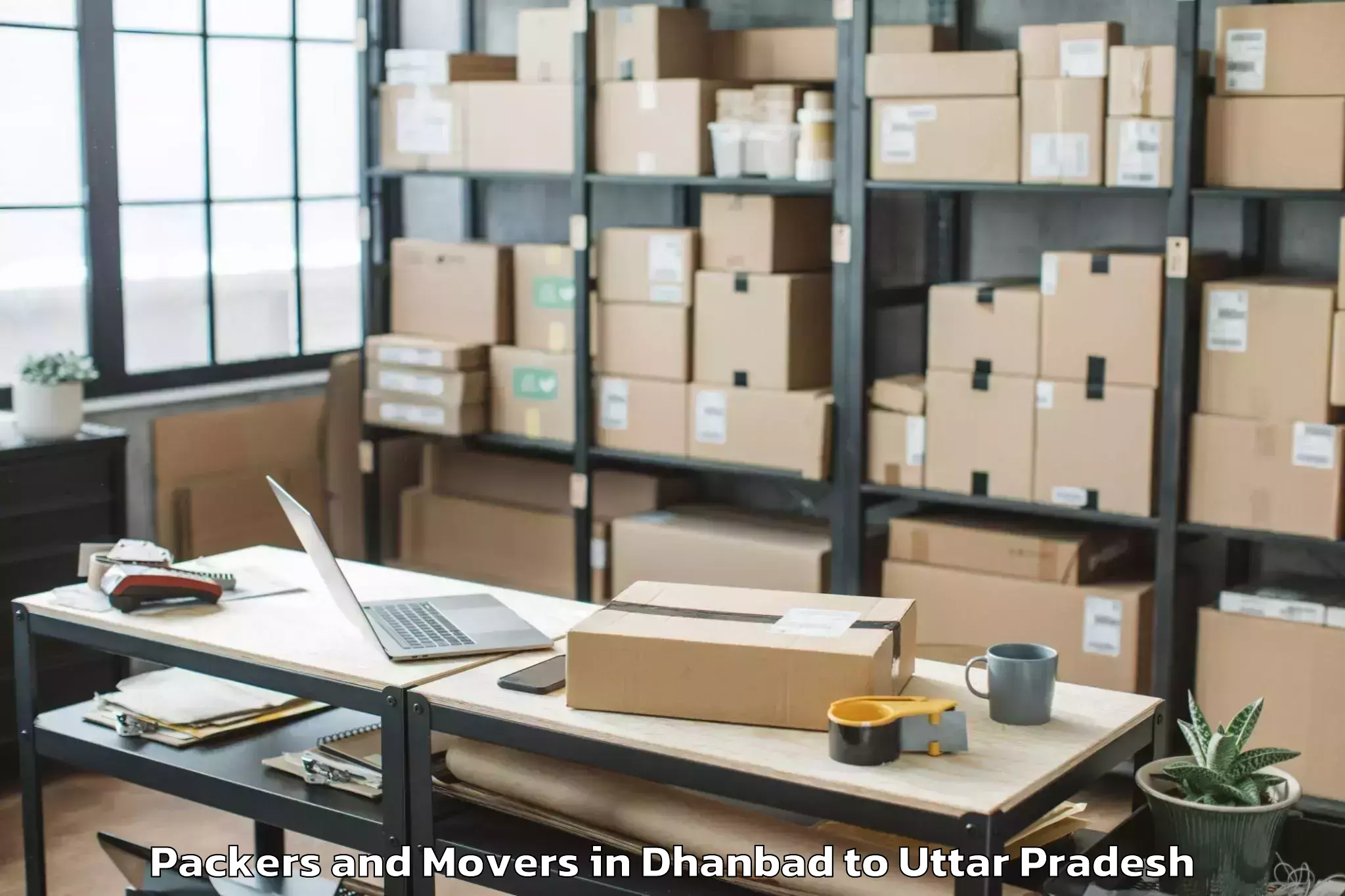 Reliable Dhanbad to Bharwari Packers And Movers